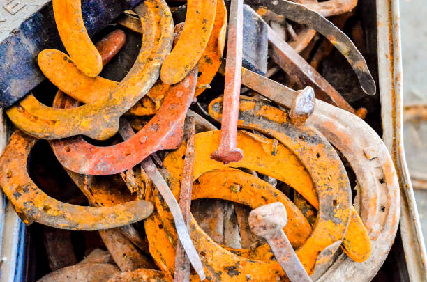 istock A pile of rusty horseshoes and nails 2172913593