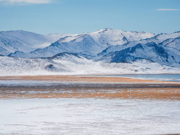 istock Severe mountains peaks covered by snow. Mongolia. 2172913890