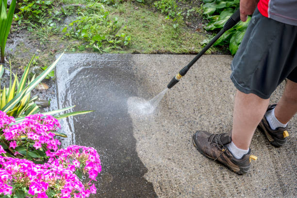 istock Person uses power washer, spring cleaning. 2172918508