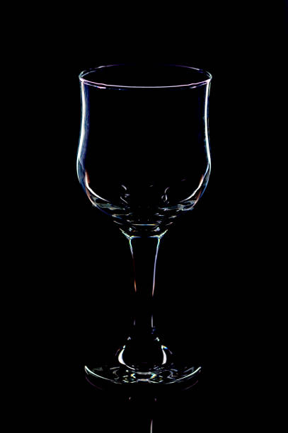 istock elegant galss of red wine on black background 2172920152