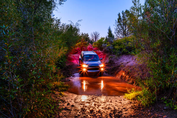 Hungary Pilis mountain range Aug. 22, 2020: An 4X4 SUV touring along on the forestry tracks and local hunting grounds.