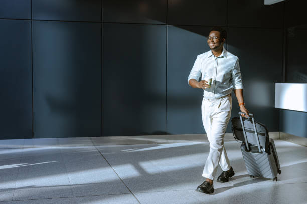 istock Afro American traveler with suitcase 2172931815