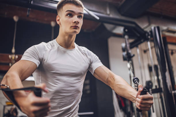 istock Strength-focused cable chest workout in gym 2172938225