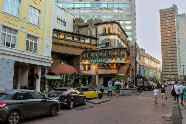 Moscow, Russia - 27, August, 2024.\nEvening walk along the legendary old Arbat.\nMulti-level restaurant in Arbatsky Lane.