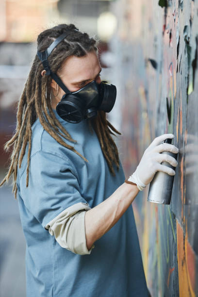 istock Creating Street Art Graffiti on Urban Wall 2172956954