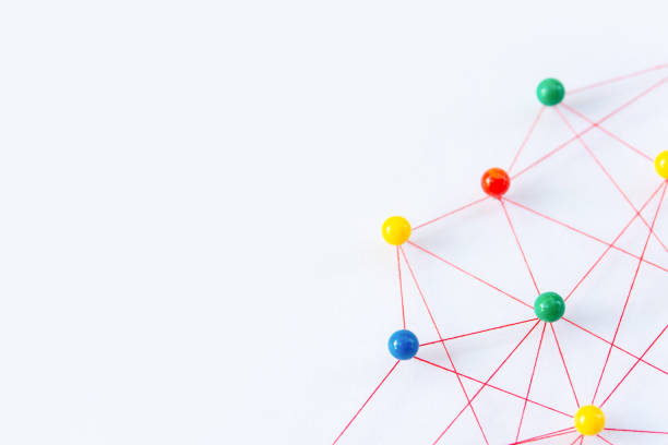 istock Linking entities, Blockchain, social media, Communications Network, The connection between the two networks. Network simulation on paper linked together by yarn 2172969705