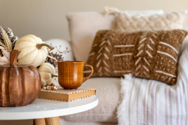 istock Fall decor on a coffee table in a cozy home 2172983724