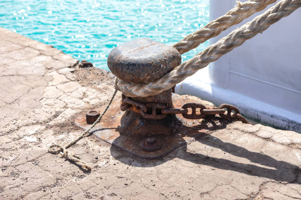 istock Rusty anchor is tied to a chain 2172992718