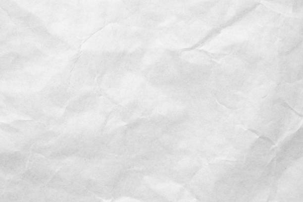 istock Abstract white crumpled and creased recycle craft paper texture background 2172998073