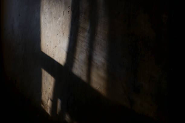 istock Sunlight entering through the window in a dark room 2172999561