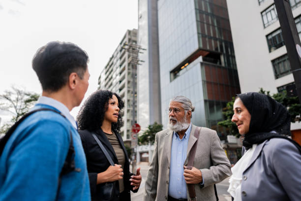 istock Coworkers talking on the city 2173003841