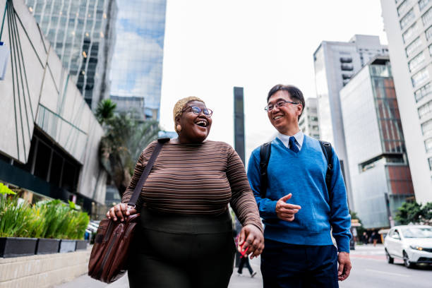 Coworkers talking on the city