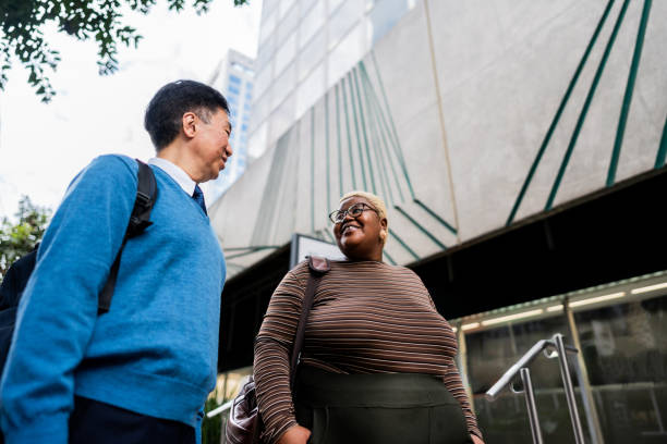 istock Coworkers talking on the city 2173004014