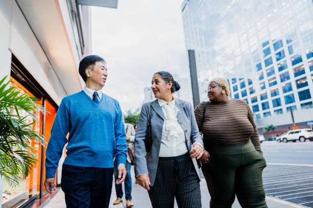istock Coworkers talking on the city 2173004605