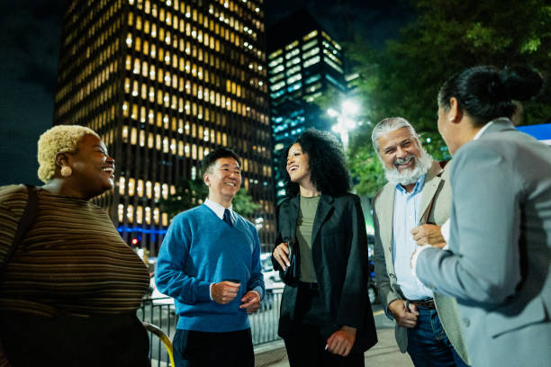 Coworkers talking on the city