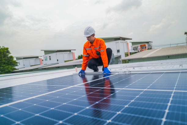 istock close up on grid of technology renewable solar energy. construction solar panels system on roof. Installing solar photovoltaic panel system. background of blue of solar cell system and structure roof. 2173005157