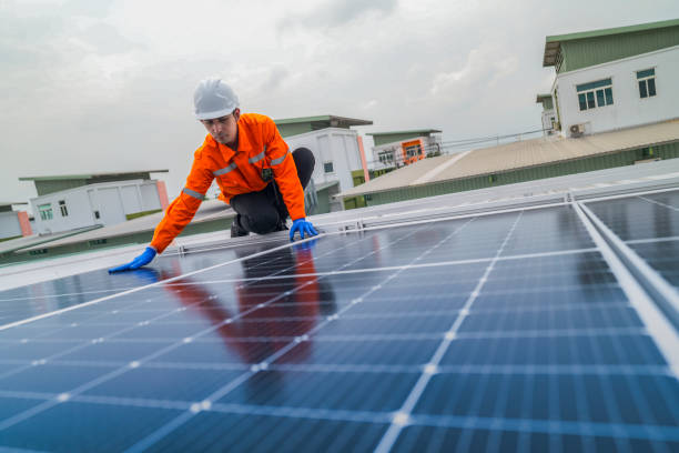 istock close up on grid of technology renewable solar energy. construction solar panels system on roof. Installing solar photovoltaic panel system. background of blue of solar cell system and structure roof. 2173005465