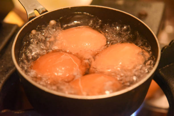 istock Close-up of eggs being cooked in boiling water, precision cooking, kitchen atmosphere, soft-boiled egg preparation 2173018426