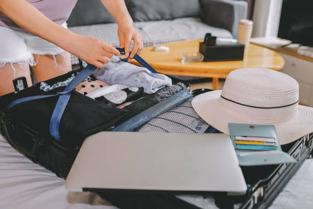 istock A Woman Packing a Suitcase for a Vacation Getaway 2173024770