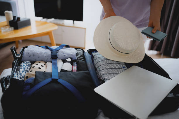 istock Organizing a Travel Suitcase with Essential Items for a Perfect Trip 2173024870