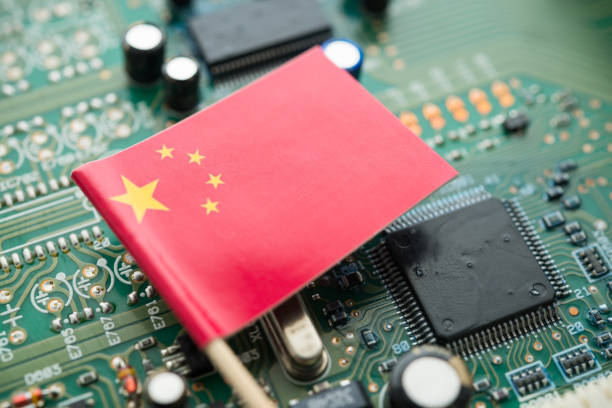 istock Chinese flag on green circuit board background. 2173026625