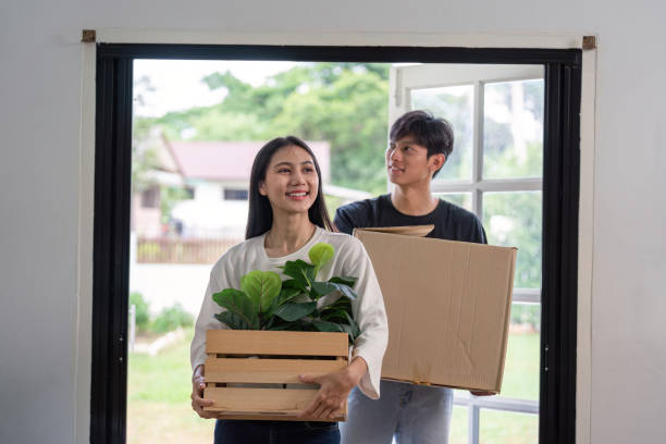 Couple Entering New Home with Relocation Success