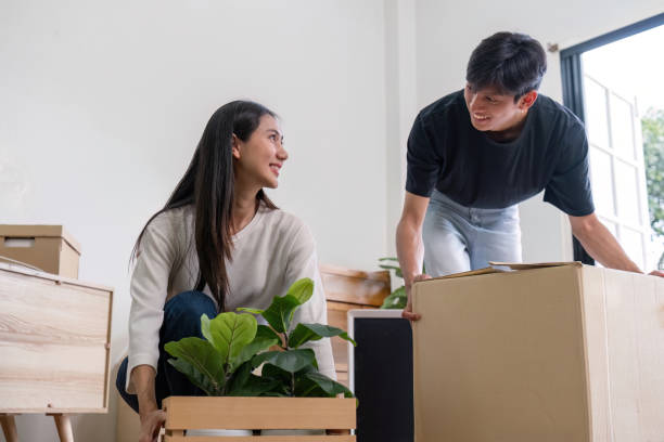 istock Harmonious Home Transition Couple Strategizing Move In Tasks 2173028281