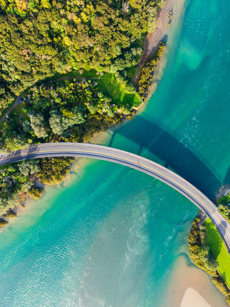 istock An asphalt highway bridge connecting two landmasses. 2173033843