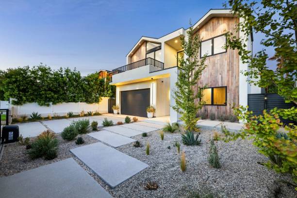 istock Modern house with wooden facade at sunset 2173043817