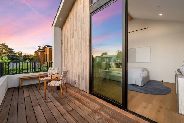 istock Modern house with wooden facade at sunset 2173043820