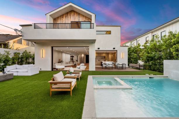 istock Modern house with wooden facade at sunset 2173043829