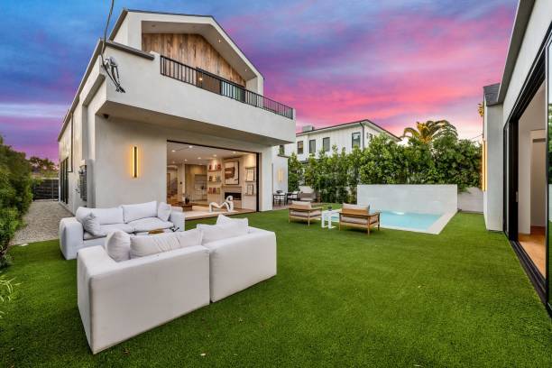 istock Modern house with wooden facade at sunset 2173043859