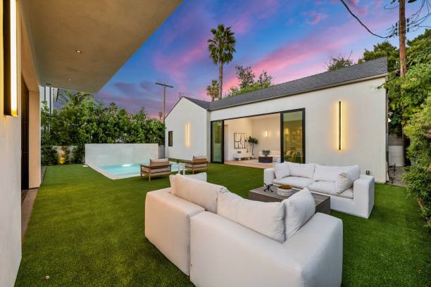 istock Modern house with wooden facade at sunset 2173043884
