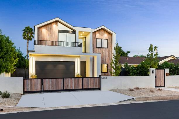 istock Modern house with wooden facade at sunset 2173043900