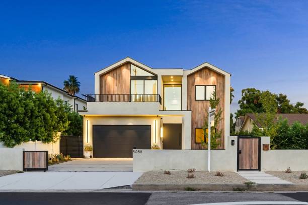 istock Modern house with wooden facade at sunset 2173043902