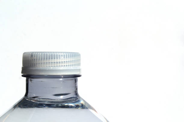 istock Close-up of a transparent plastic water bottle with a white cap 2173045226