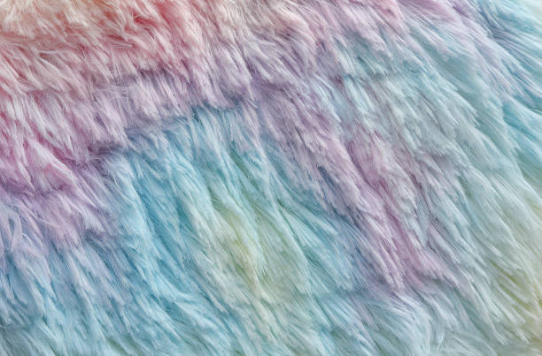istock Multicolored fur texture. Shaggy blanket background. Fluffy fake textile fur. 2173046080