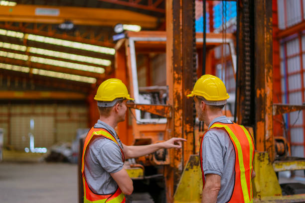 istock Blue collar worker are working at metal sheet warehouse. 2173046254