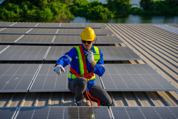 istock Blue collar workers is checking solar panel at roof top. 2173046296