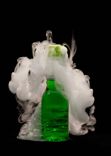 istock Smoke filled and bubble filled plastic bottles with bubbles and foam busting out 2173047211