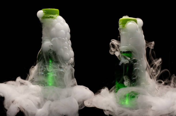 istock Smoke filled and bubble filled plastic bottles with bubbles and foam busting out 2173047225