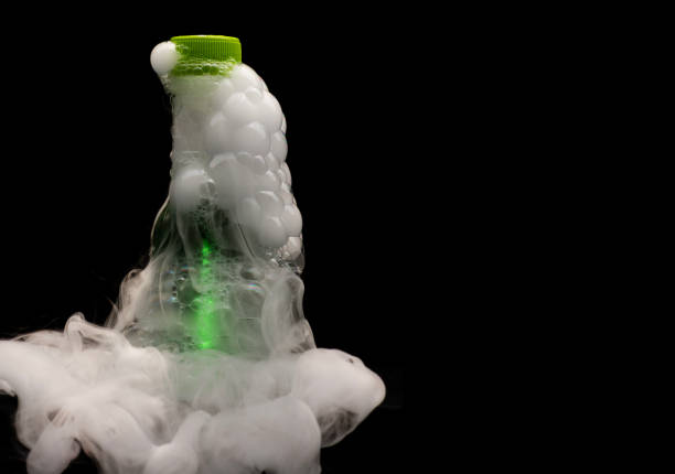 istock Smoke filled and bubble filled plastic bottles with bubbles and foam busting out 2173047227