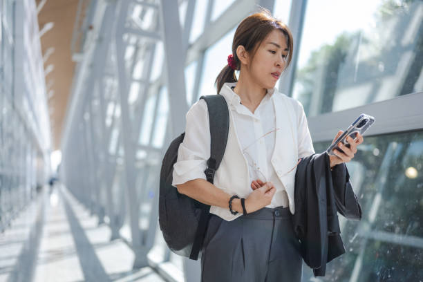 istock On Her Way: A Businesswoman’s Stop at the Train Station 2173050477