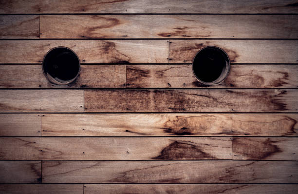 istock Brown wooden wall texture with portholes 2173054454