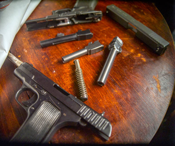 istock guns disassembled for cleaning or repair 2173057304