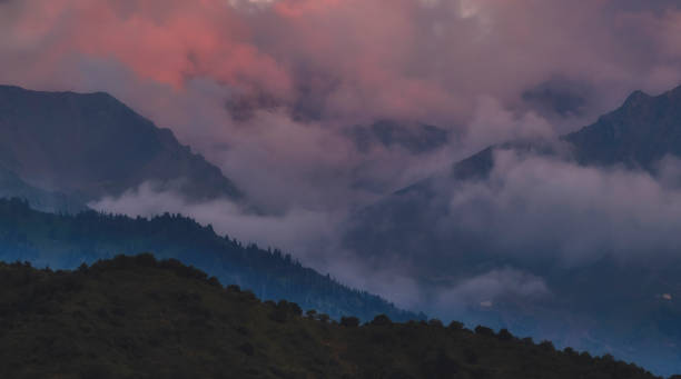 istock Beautiful clouds in the mountains at sunset after the rain. 2173061912