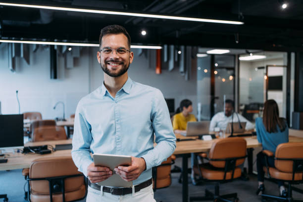 istock Confident businessman and his team. 2173062381