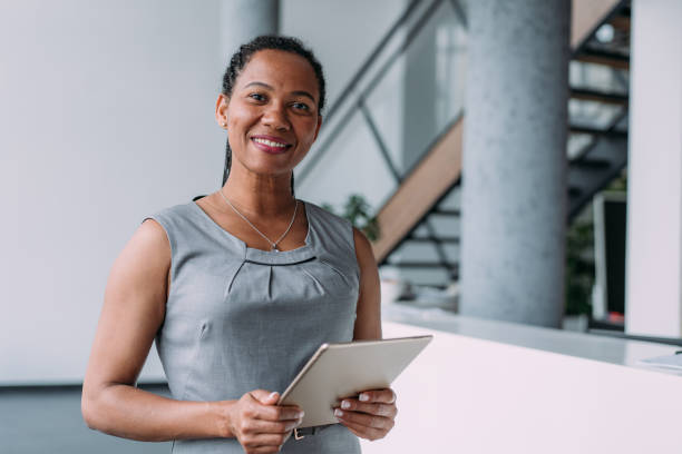istock Confident businesswoman in modern office. 2173063004