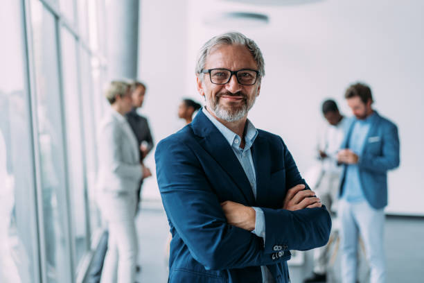 istock Confident businessman and his team. 2173063058