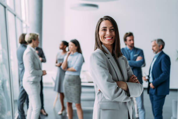 istock Confident businesswoman and her team. 2173063061